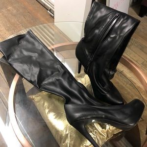 Knee High heel boots by Jennifer Lopez